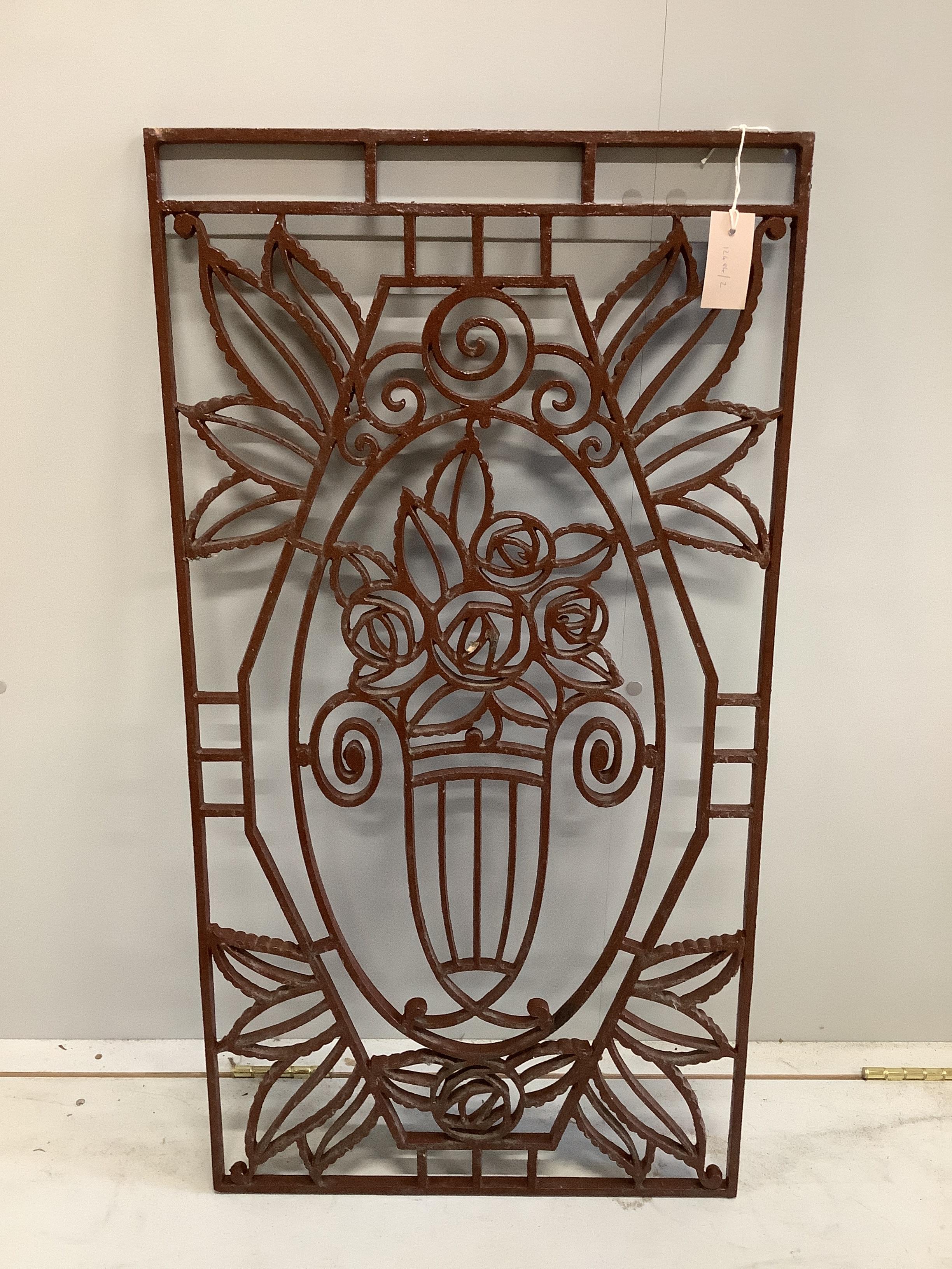 A decorative rectangular wrought iron panel width 50cm, height 95cm.